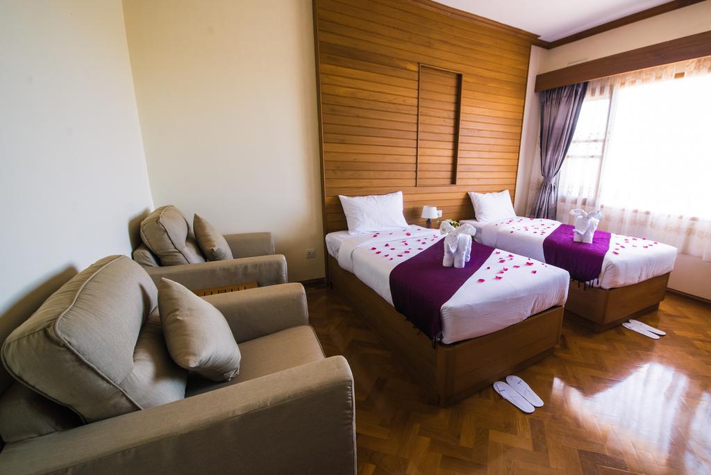 Win Unity Hotel Пин О Луин Екстериор снимка