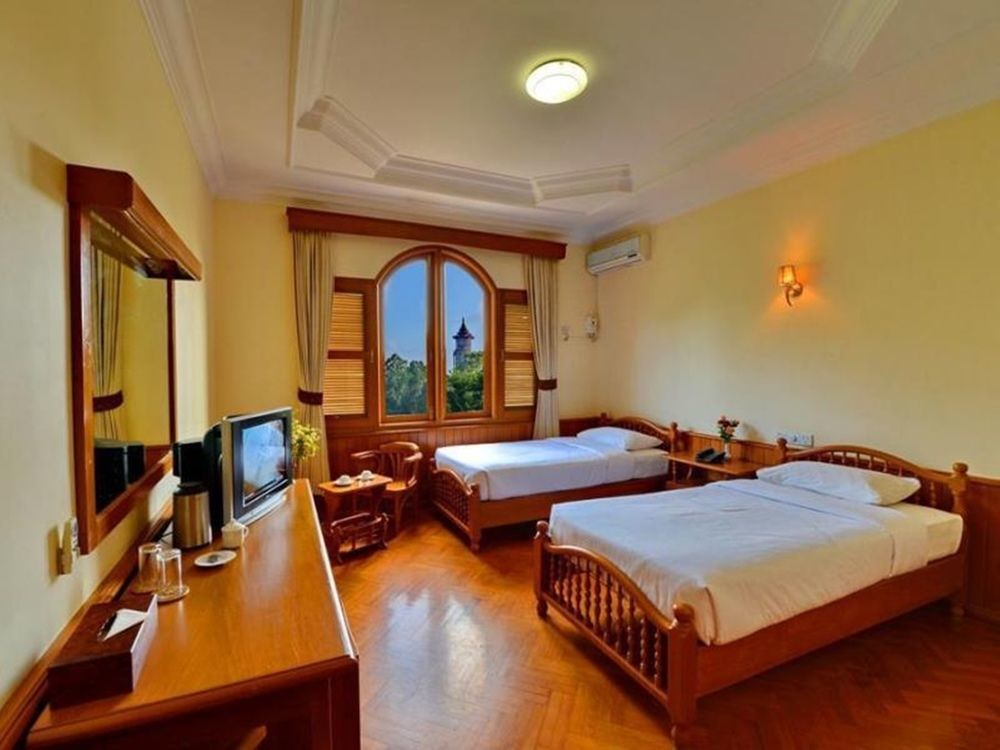 Win Unity Hotel Пин О Луин Екстериор снимка